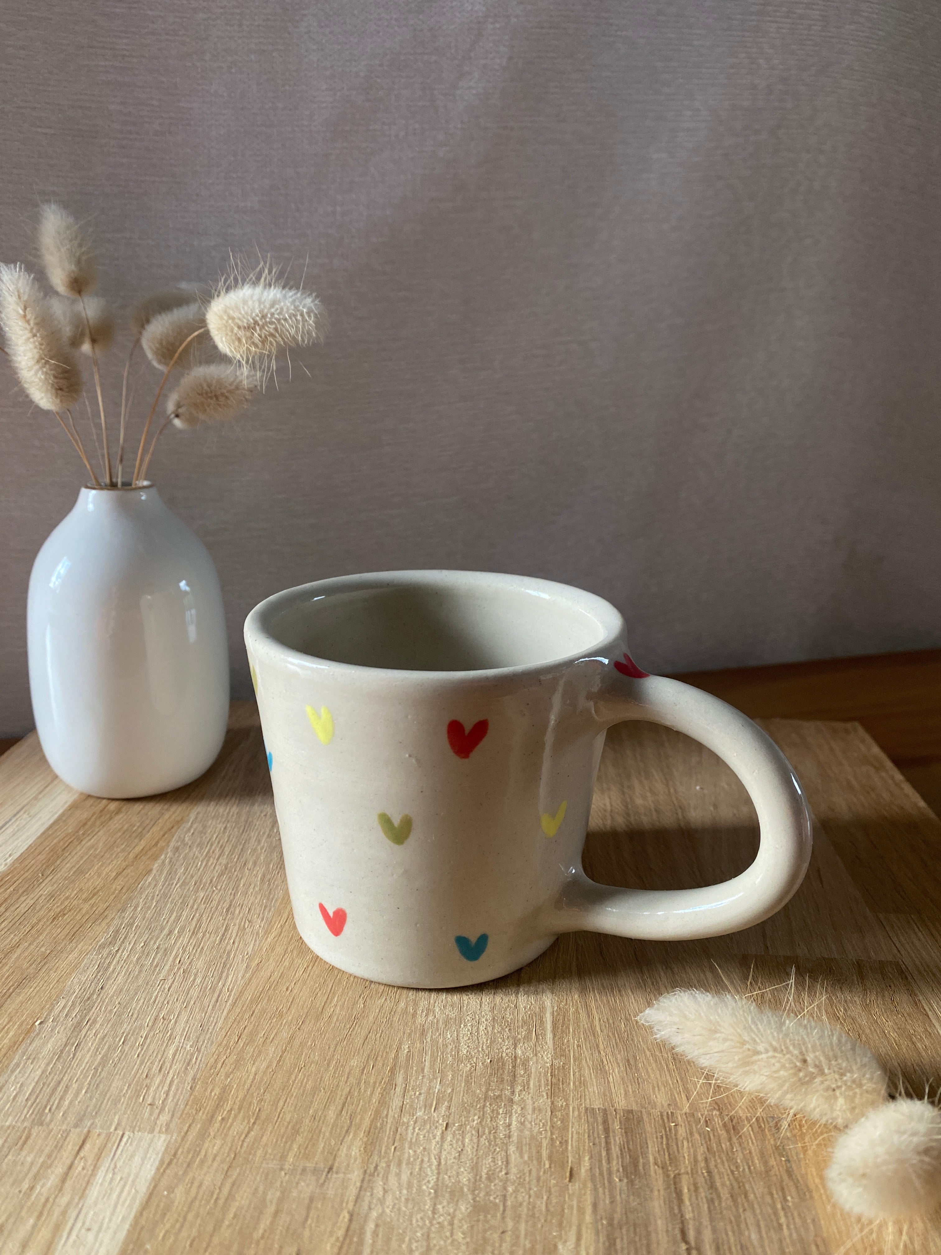 Tasse cœurs multicolores